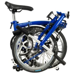 Brompton C Line Explore - 6-Speed - Low Bar - Standard Seatpost - Rear Rack & Dynamo - 16" Folding Bike - 2022 - Picadilly Blue Matt 9 Brompton C Line Explore - 6-Speed - Low Bar - Standard Seatpost - Rear Rack & Dynamo - 16" Folding Bike - 2022 - Picadilly Blue Matt -Bike Sale Shop c line explore 6 speed low bar standard seatpost dynamo picadilly blue matt 3 1216721 1